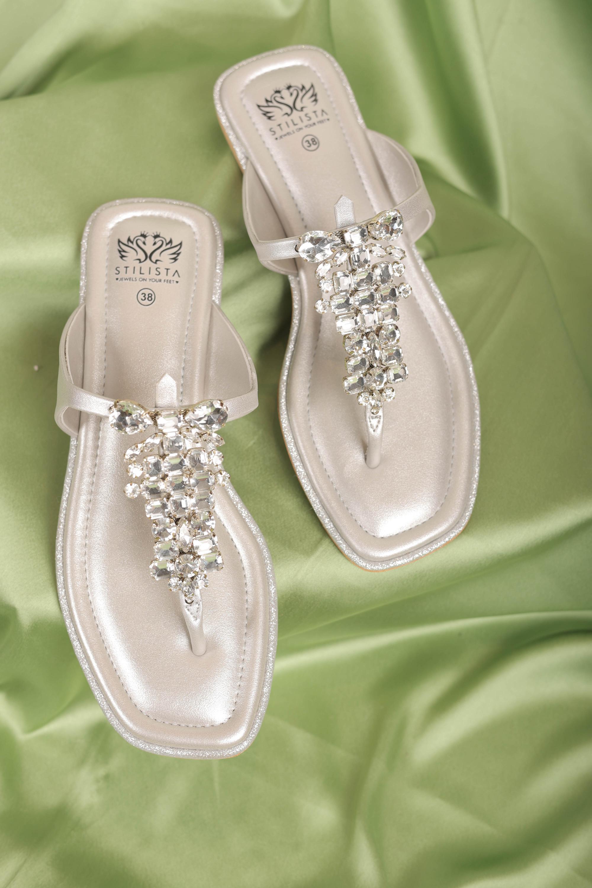 Silver flats studded with stones