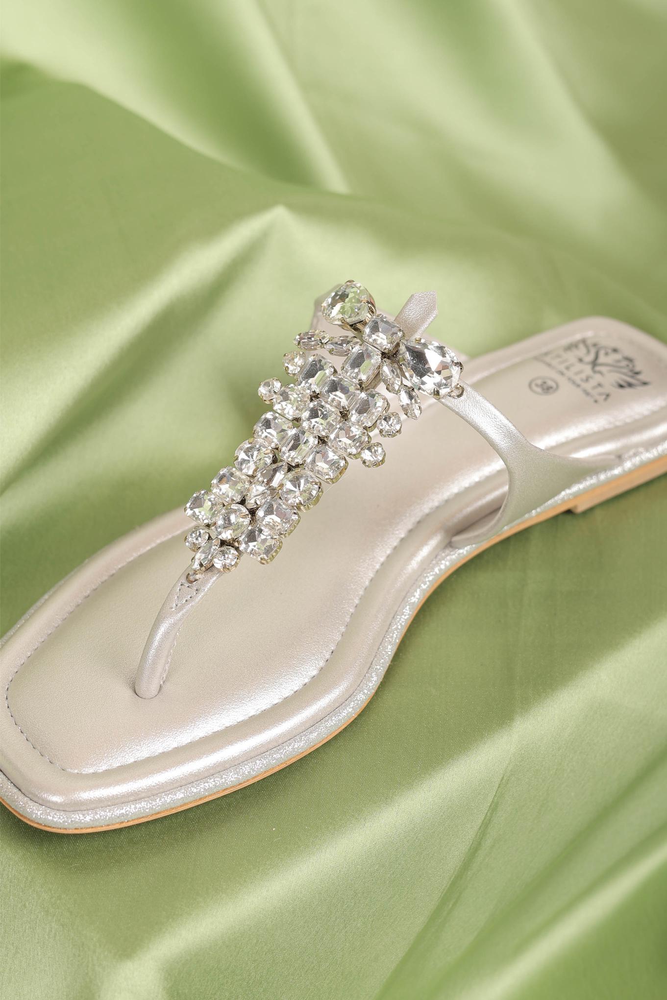 Silver flats studded with stones