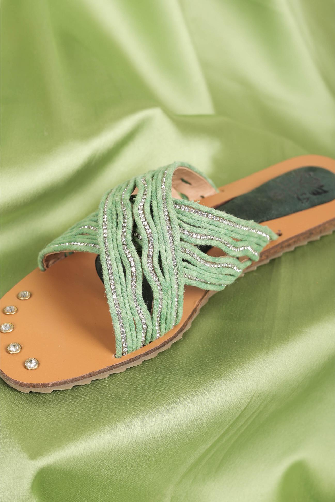 Green cross strap flats in round toe slides