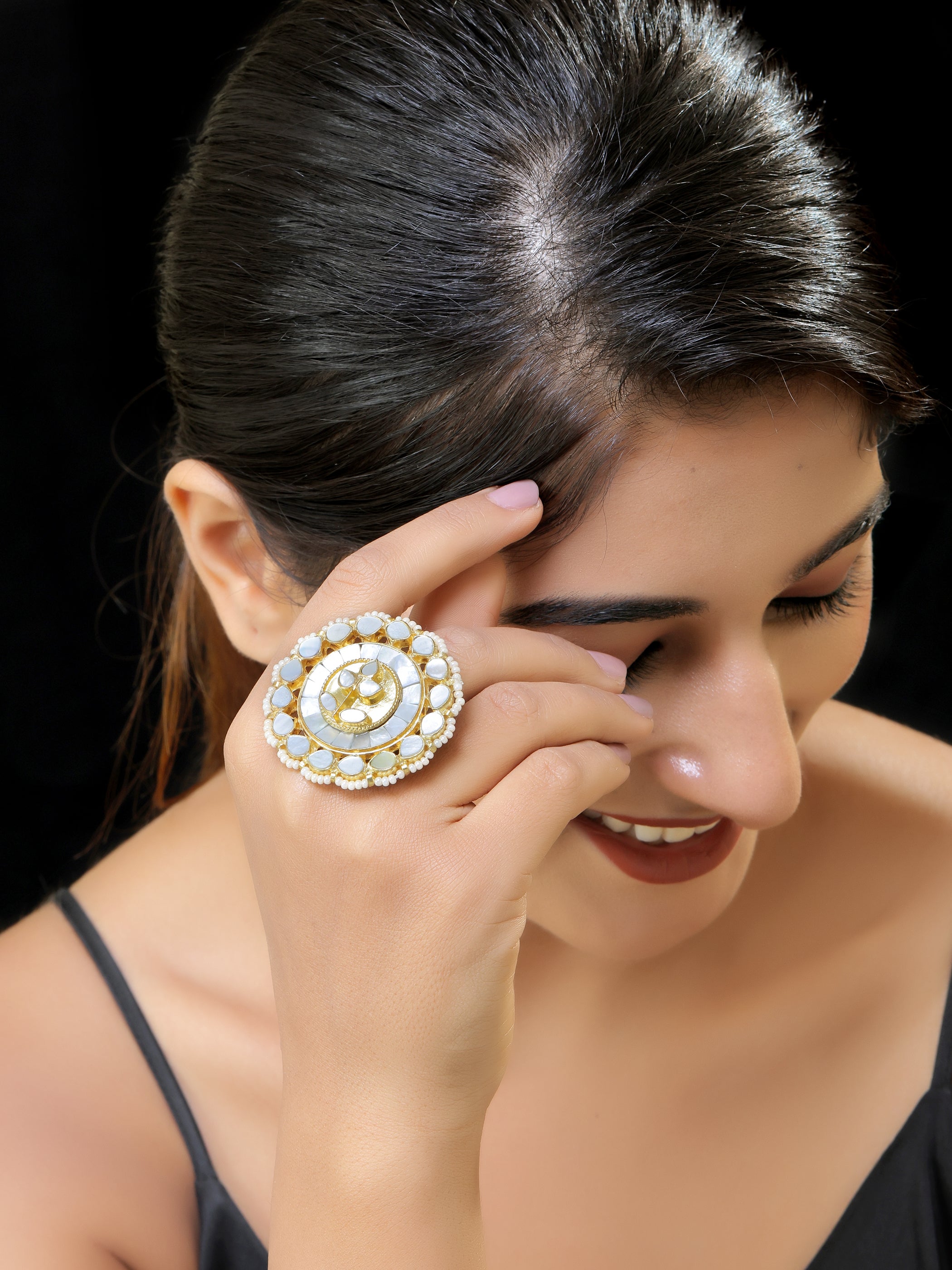 Gold finish kundan mother of pearls ring