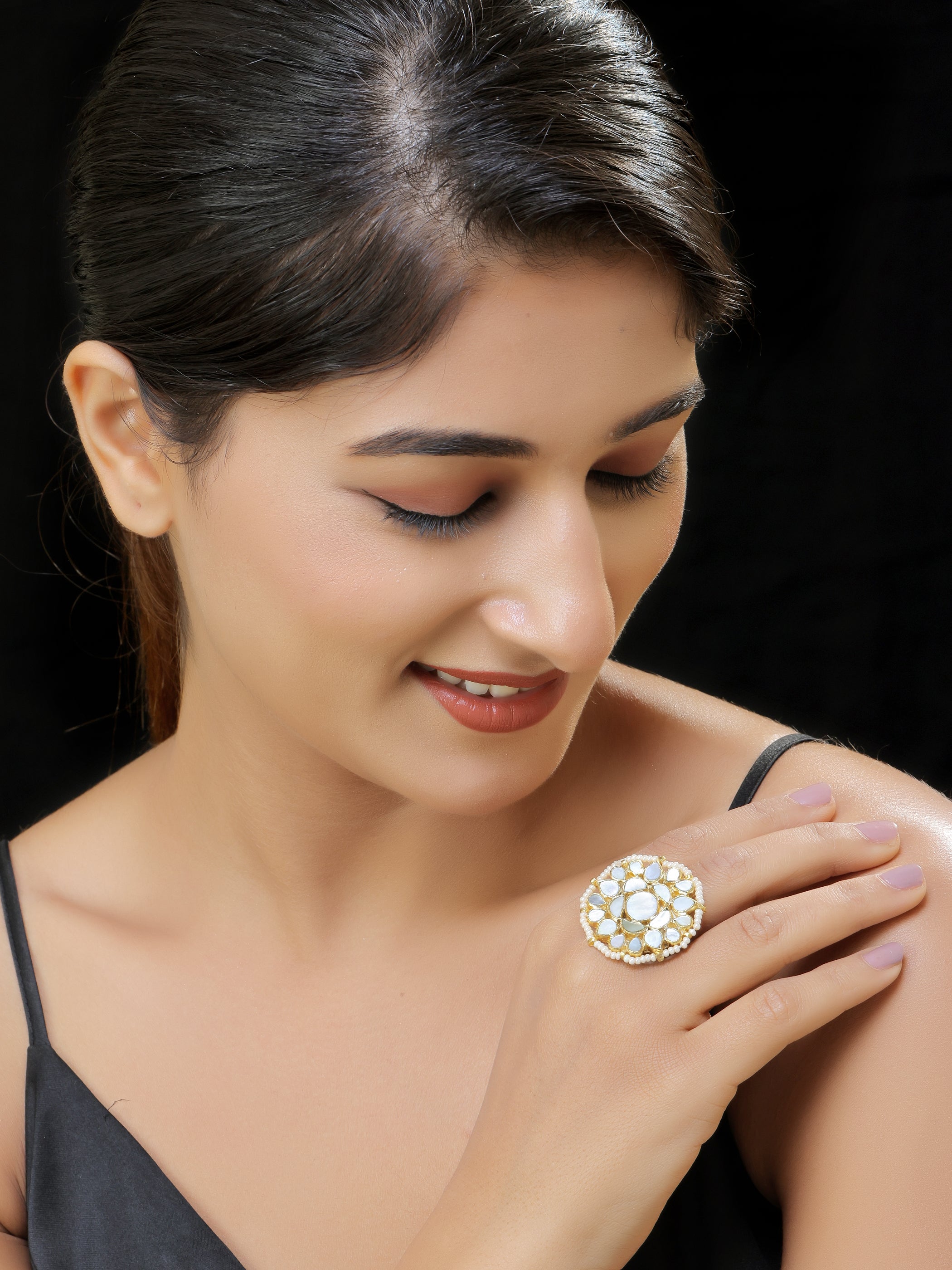 Gold finish kundan mother of pearls ring