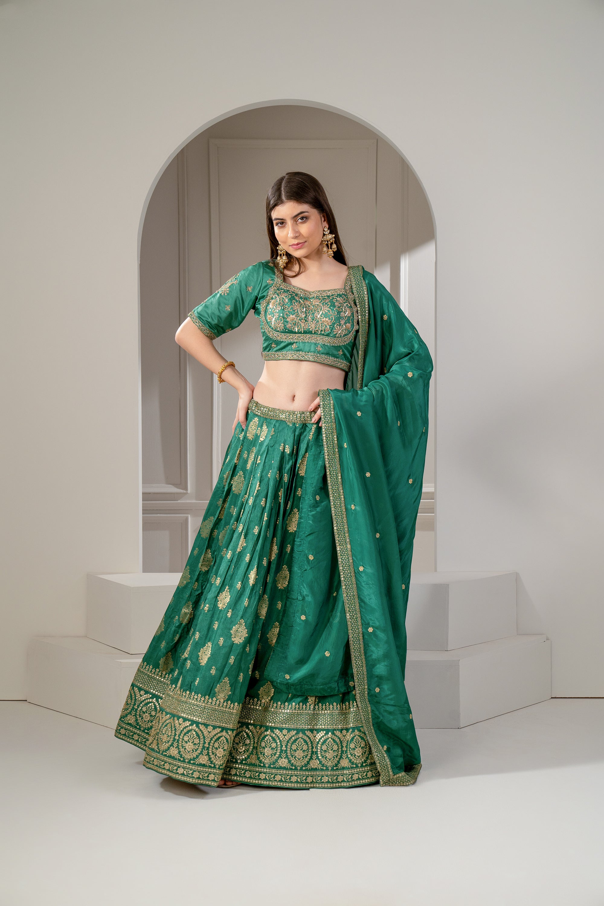 Emerald Green Soft Silk Sequins and Zari Embroidered Lehenga Set.