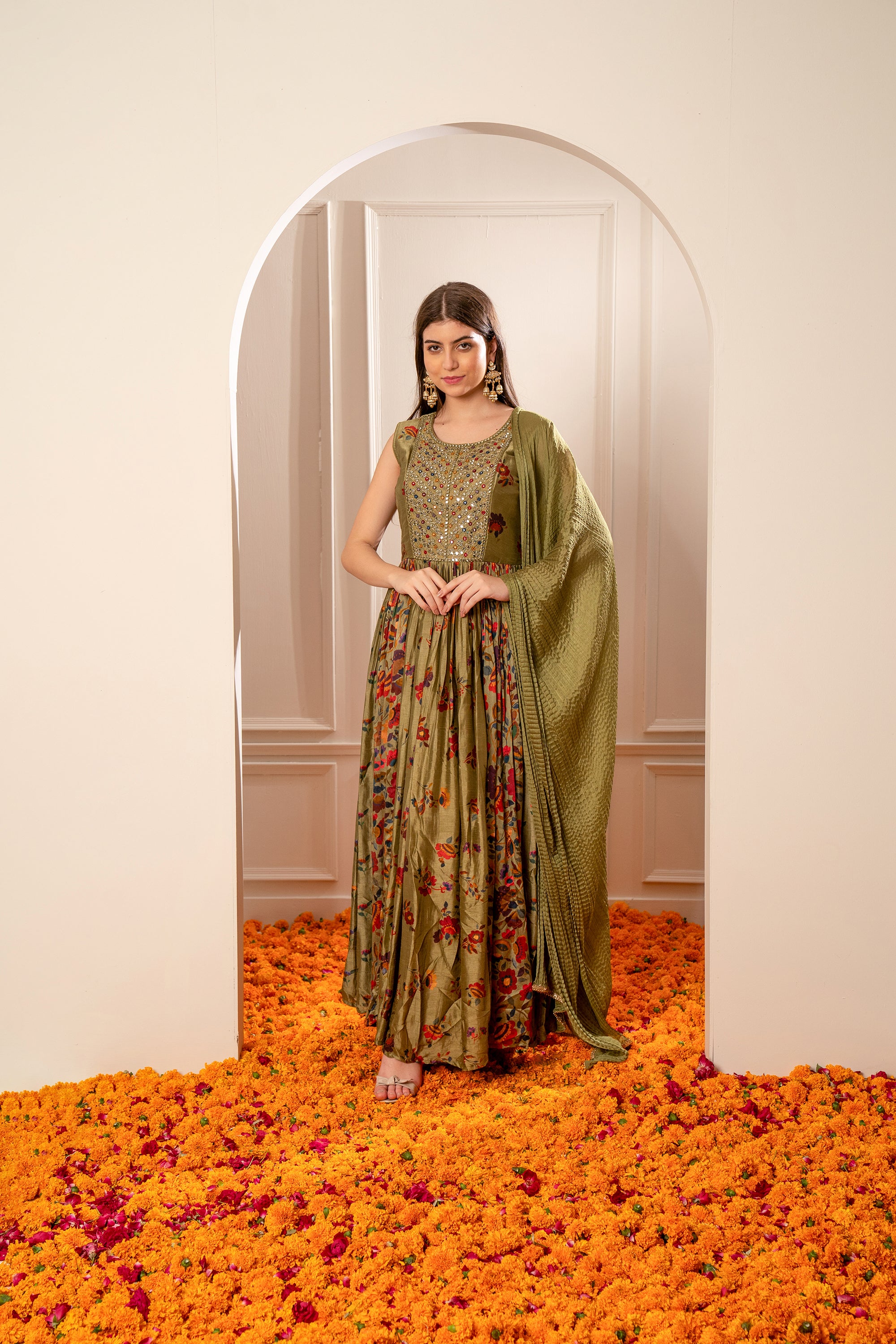 Mehendi Green Silk Gown with Mirror Embellishments.