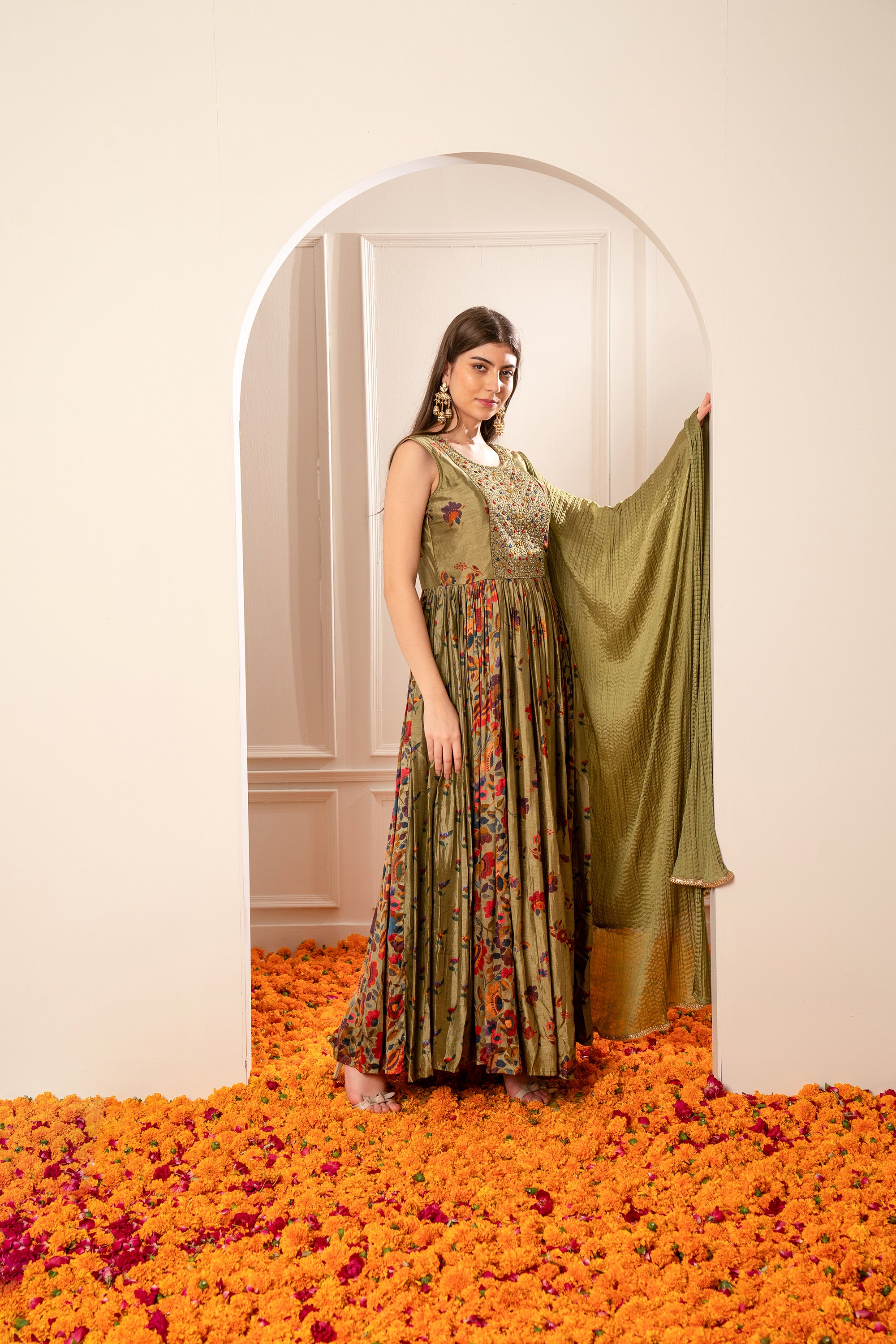 Mehendi Green Silk Gown with Mirror Embellishments.