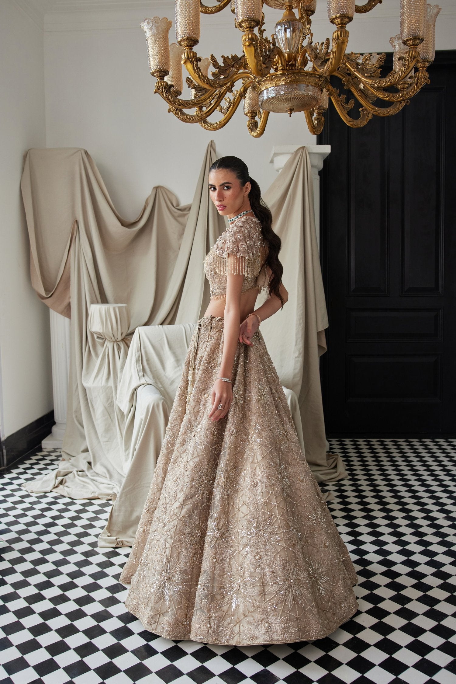 Beige Lehenga With An Embellished Shoulder Cape