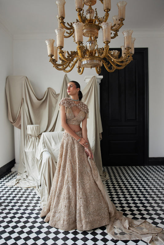 Beige Lehenga With An Embellished Shoulder Cape