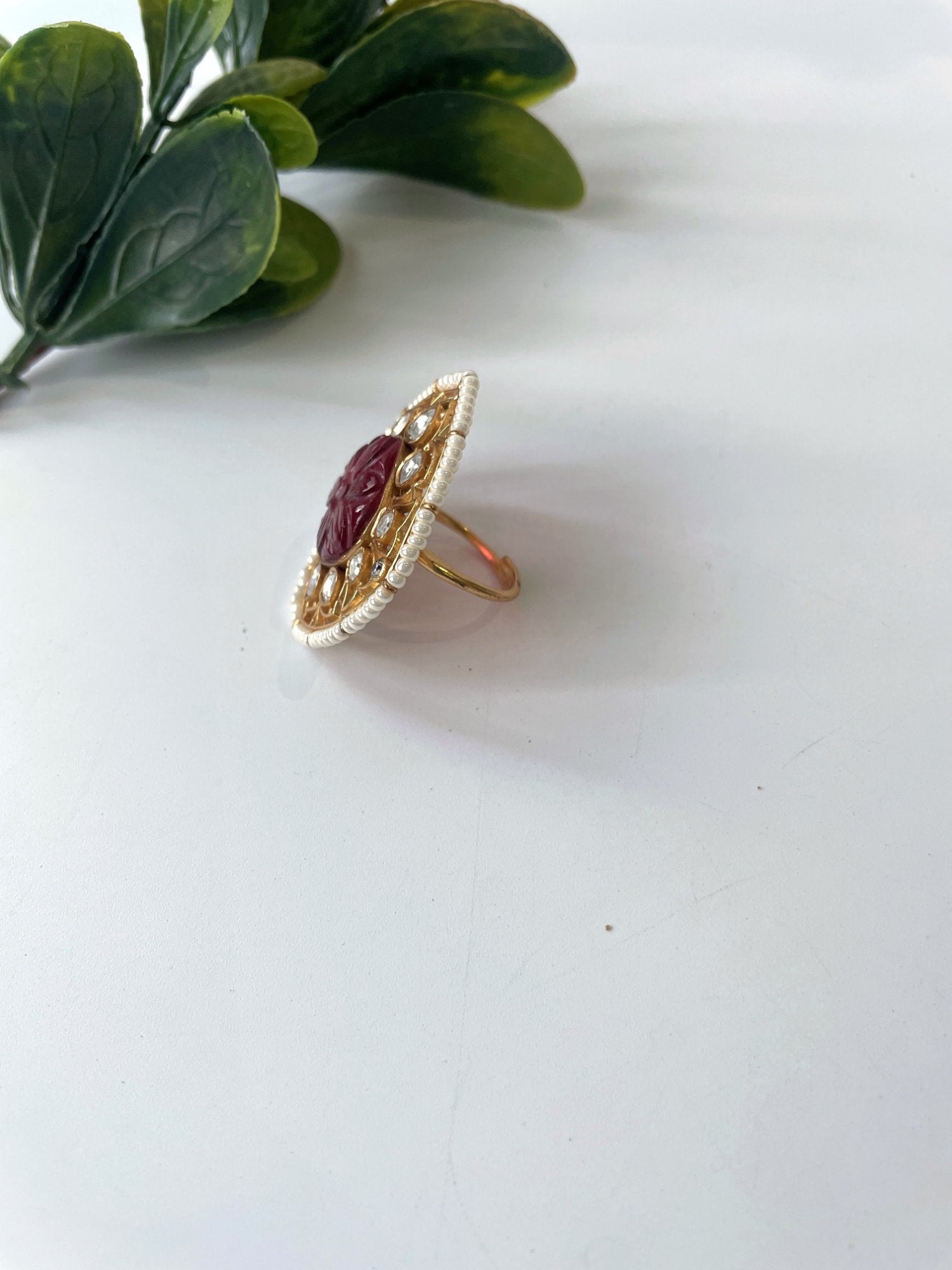 Red carved stone kundan ring