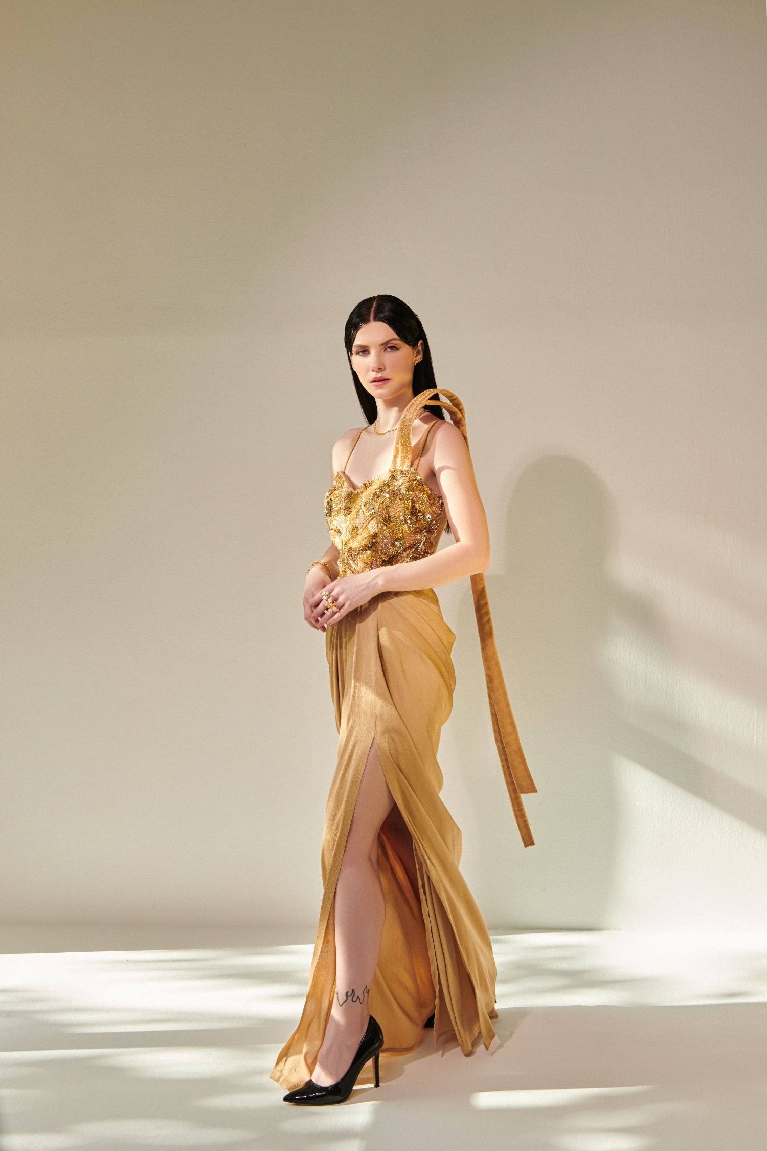 Golden Hand Embroidered Drape Gown With 3D Hand Embellished Trail